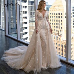 Abito da Sposa di lusso con coda staccabile e applicazioni di pizzo a forma di sirena, scollatura a V con maniche lunghe.